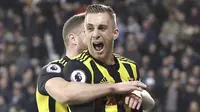 Pemain Watford, Gerard Deulofeu, melakukan selebrasi usai membobol gawang West Ham United pada laga Premier League di Stadion London, Sabtu (22/12). Watford menang 2-0 atas West Ham United. (AP/Chris Radburn)