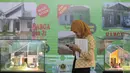 Pengunjung bermain ponsel saat mengunjungi pameran Indonesia Properti Expo 2016, Jakarta, Rabu  (17/2). Penjualan properti tahun ini diprediksi mengalami peningkatan dikisaran 5%-10% jika suku bunga acuan BI turun 50 basis poin (Liputan6.com/Angga Yuniar)