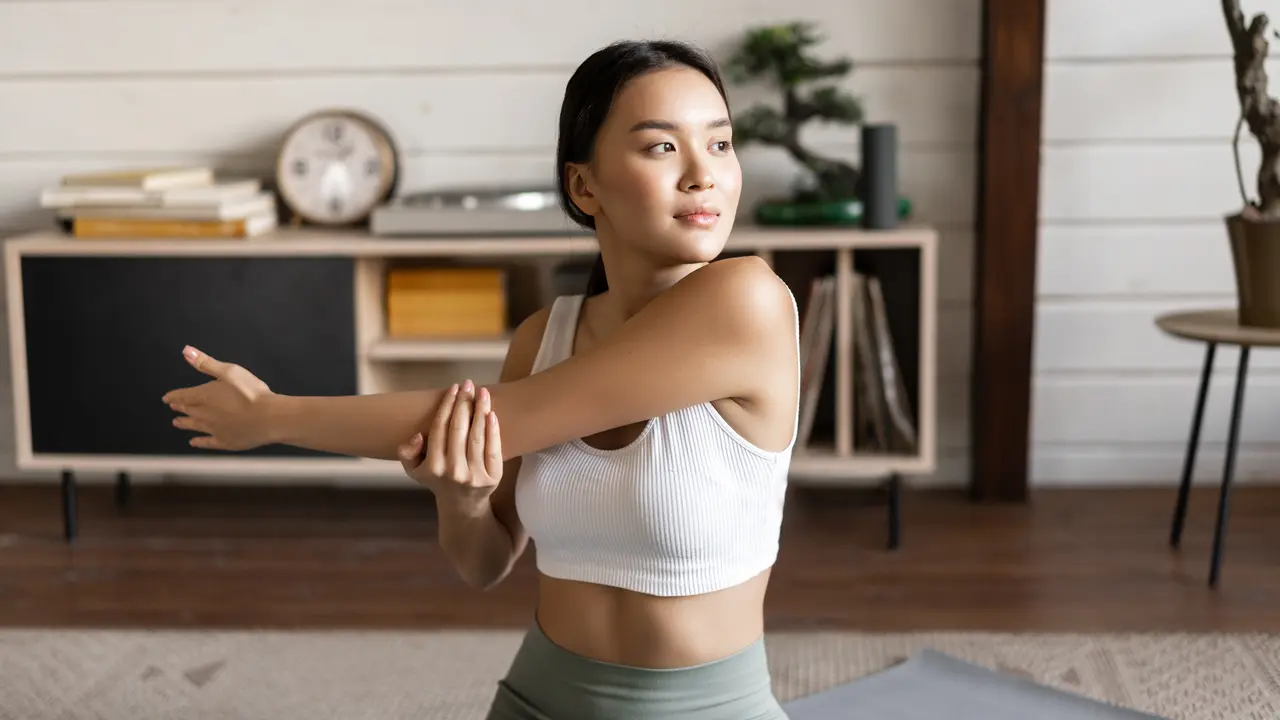 wanita november olahraga stretching