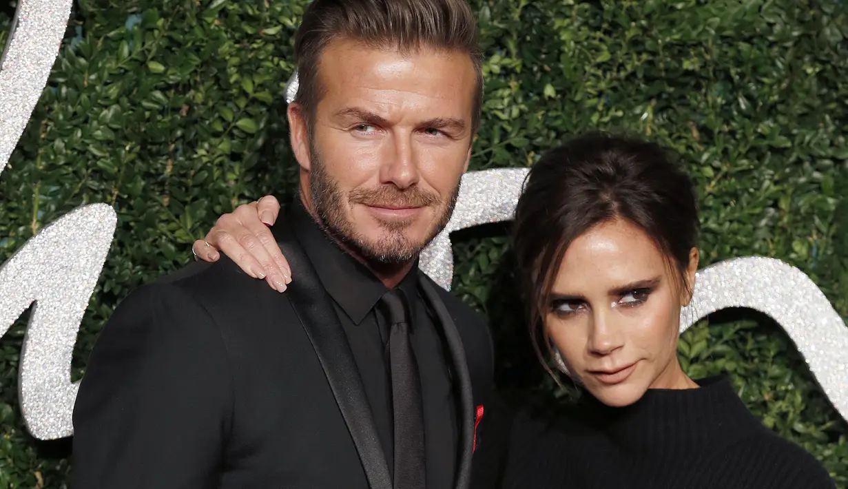 David Beckham dan Victoria Beckham memang telah menjadi salah satu pasangan selebriti Hollywood yang paling romantis dan membuat iri orang banyak akan keharmonisannya. (AFP/JUSTIN TALLIS)