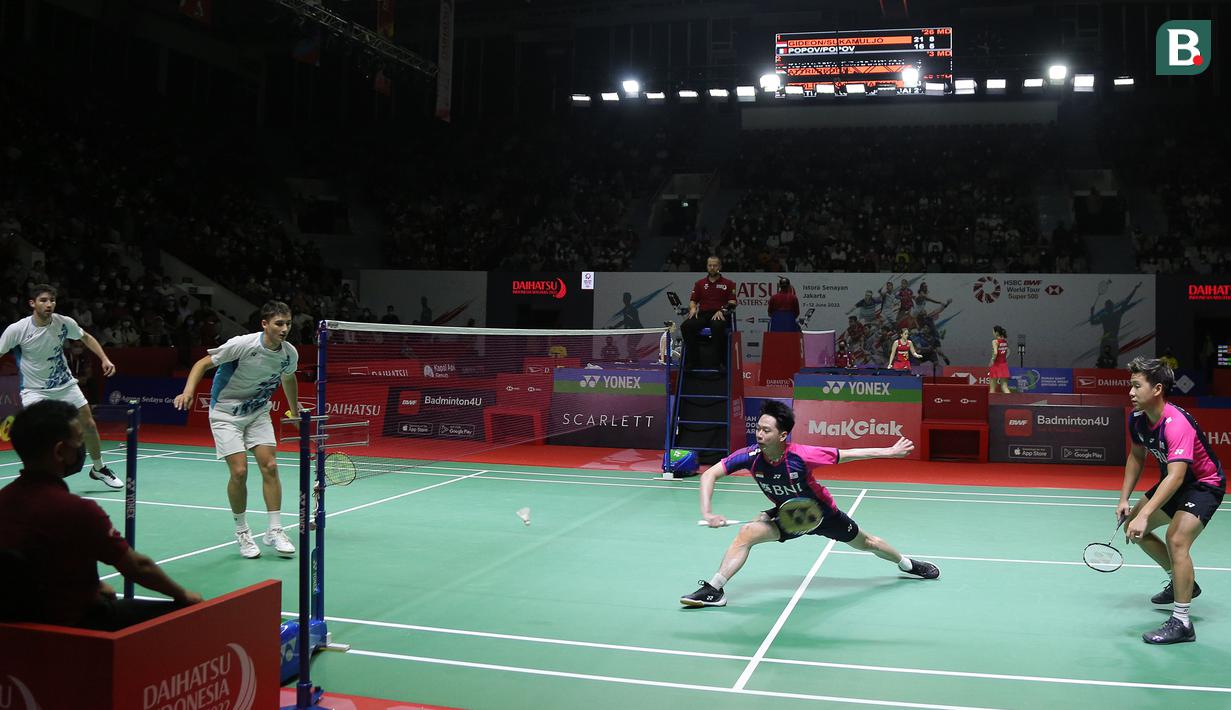 <p>Sejak awal gim pertama, Marcus/Kevin langsung memberikan tekanan ke Popov bersaudara. Bahkan, The Minions mampu unggul 6-1 dari wakil Prancis tersebut. Sempat hanya berselisih satu angka, pasangan Indonesia berhasil unggul dengan skor 11-8 hingga interval gim pertama. (Bola.com/Ikhwan Yanuar)</p>