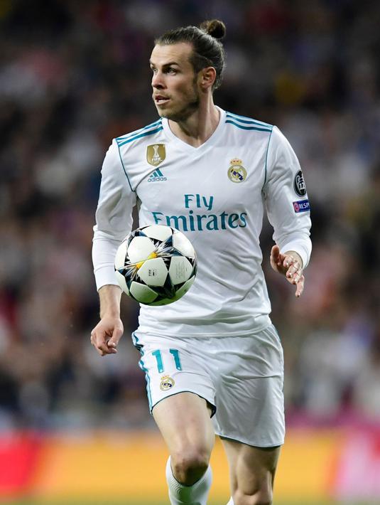 Dengan kepergian Ronaldo, sudah semestinya Julen Lopetegui membawa Bale menjadi bintang baru Real Madrid. Memaksimalkan kembali potensi yang ada pada diri Bale (AFP/Javier Soriano)