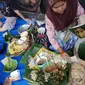 Nasi pecel menjadi makanan favorit warga Solo dengan racikan bumbu kacang tanah yang terasa legit (Liputan6.com / Nefri Inge)