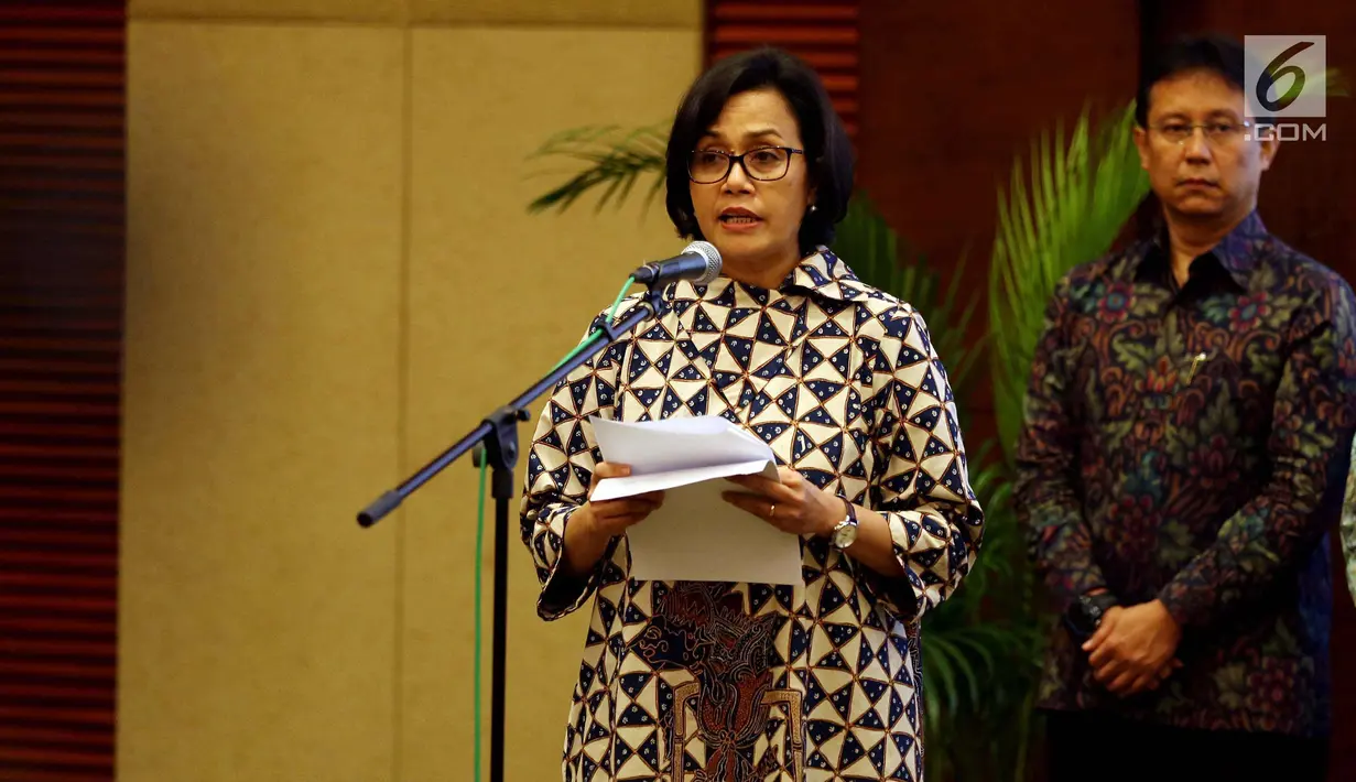 Menkeu Sri Mulyani memberikan sambutan saat acara  penandatangan perjanjian Pemerintah Pusat, Pemprov Papua, Pemkab Mimika dan PT Inalium tentang Pengambilan Saham Divestasi PT Freeport Indonesia, Jakarta, Jumat (12/2). (Liputan6.com/Johan Tallo)