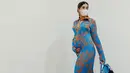 Kali ini, Tasya Farasya tampil seru dengan printed dress. Motif bunga dengan nuansa kontras berpotongan fit dengan tubuh menampilkan baby bump-nya yang tampak kian menggemaskan. (Instagram/tasyafarasya).