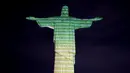 "Selamat datang di Brasil," bunyi tulisan di patung itu dengan menampilkan 27 nama negara yang akan dan telah dikunjungi Swift dalam rangkaian konsernya, Eras Tour. (Florian Plaucher / AFP)
