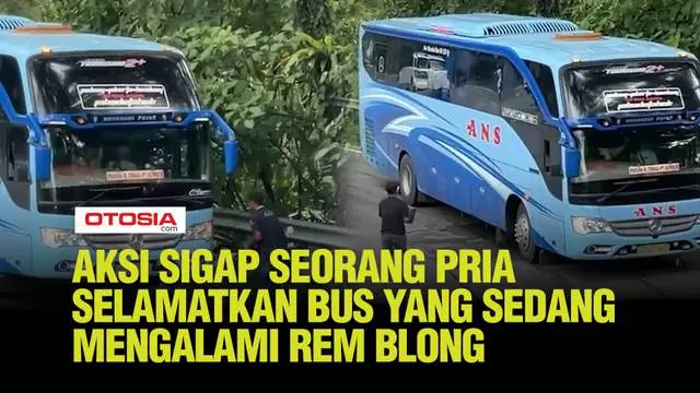 Terlihat bagaimana pria tersebut sigap mengambil sepotong bongkahan kayu yang tersedia di sekitar area. Ia memasukkan kayu tersebut untuk mengganjal ban belakang bus yang sedang bermasalah.