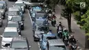 Pengendara sepeda motor melintas di Jalan MH Thamrin, Jakarta, Senin (2/7). Sistem ganjil-genap untuk sepeda motor rencana akan diberlakukan mulai pukul 06.00-10.00 WIB di Jalan MH Thamrin dan Medan Merdeka Barat. (Merdeka.com/ Iqbal S. Nugroho)