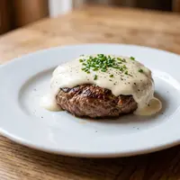 Resep Beef Patty Saus Creamy yang Lembut dan Juicy. (Foto: AI Generated)