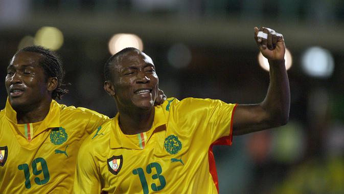 Mantan pemain Timnas Kamerun, Eric Djemba-Djemba. (ALEXANDER JOE/AFP)