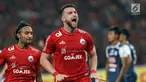 Pemain Persija, Marko Simic merayakan gol ke gawang Arema FC pada lanjutan Go-Jek Liga 1 Indonesia 2018 bersama Bukalapak di Stadion GBK Jakarta, Sabtu (31/3). Persija unggul 3-1 atas Arema FC. (Liputan6.com/Helmi Fithriansyah)