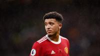 Jadon Sancho - Winger Setan Merah ini harus menelan pil pahit usai terdepak dari skuad Timnas Inggris. Penampilan Sancho yang masih melempem bersama MU membuat Pelatih Inggris Gareth Southgate tidak memanggilnya pada Kualifikasi Piala Dunia 2022. (AFP/Oli Scarff)