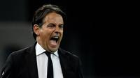 Pelatih Inter Milan, Simone Inzaghi saat laga Liga Italia 2023/2024 melawan Udinese di Friuli - Dacia Arena stadium, Udinese, Italia, Selasa (09/04/2024) WIB. (AFP/Filippo Monteforte)