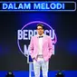 Armand Maulana sebagai host kuis Berpacu Dalam Melodi (https://www.instagram.com/p/COU4e8-LqL0/)