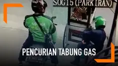 Aksi pencurian terekam kamera CCTV. Dua orang pria berkedok driver dan penumpang ojek online mengambil tabung gas 3 kilogram dari sebuah gerobak pedagang batagor.