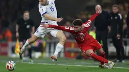 Laga tersebut berlangsung sengit dan harus ditentukan melalui babak penalti setelah skor 1-1 tak berubah hingga berakhirnya waktu tambahan 2x15 menit. (AFP/Darren Staples)