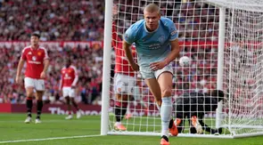 Erling Haaland dari Manchester City melakukan selebrasi setelah mencetak gol pertama timnya dalam pertandingan Liga Inggris melawan Manchester United di Manchester, Inggris, Minggu, 13 September 2026. (Peter Byrne/PA via AP)
