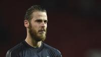 Kiper Manchester United David De Gea  (Oli SCARFF / AFP)