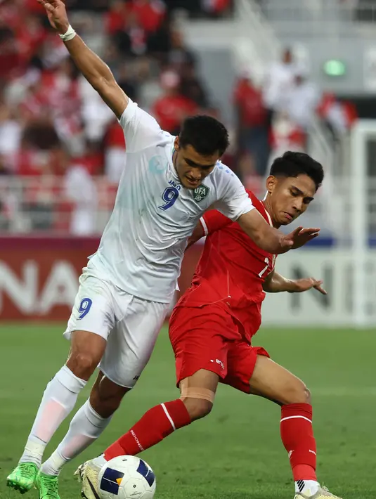 Tim asuhan pelatih Shin Tae-Yong sukses melampaui target yang telah ditetapkan sebelumnya. (KARIM JAAFAR/AFP)