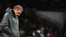 Pelatih Tottenham Hotspur, Ange Postecoglou, tak mampu menutupi kekecewaan setelah anak asuhnya kembali telan kekalahan di lanjutan Liga Inggris 2024-2025. Kali ini Spurs dipermalukan Leicester City dengan skor 1-2. Kekalahan ini membuat sang juru taktik karena gagal meraih kemenangan dalam tujuh laga terakhir di Liga Inggris. (Mike Egerton/PA via AP)