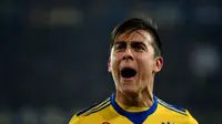 Penyerang Juventus, Paulo Dybala dikaitkan dengan Real Madrid dan Manchester United (MU). (ALBERTO PIZZOLI / AFP)