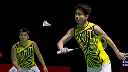Pasangan unggulan teratas itu pun akhirnya berhasil menutup laga dengan kemenangan dua gim langsung dengan skor 21-13 dan 21-19. (Badminton Photo/Raphael Sachetat)