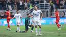 Pemain Persita Tangerang, Tamirlan Kozubaev, tampak kecewa setelah ditaklukkan Persija Jakarta dalam laga pekan pertama BRI Super League 2025/2026 di Jakarta International Stadium (JIS), Minggu (10/8/2025) malam WIB. (Bola.com/M Iqbal Ichsan)