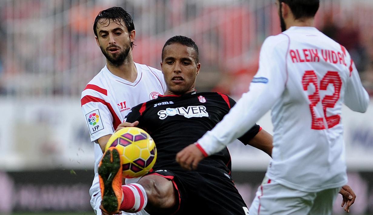 Youssef El Arabi. Pemain kelahiran Prancis ini lebih memilih memperkuat Timnas Maroko di level Intenasional. Di La Liga ia telah mencetak 44 gol untuk Granada pada musim 2012/13 hingga musim 2015/16 dengan penampilan sebanyak 130 kali. (AFP/Cristina Quicler)