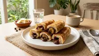Resep Roti Tawar Gulung Isi Pisang Cokelat yang Lumer dan Praktis untuk Sarapan