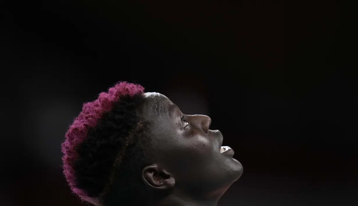Ekspresi atlet bola voli asal Kenya, Sharon Chepchumba Kiprono saat pertandingan babak penyisihan  grup A bola voli putri Olimpiade Tokyo 2020  melawan Korea Selatan, Selasa (27/7/2021). (Foto: AP/Manu Fernandez)