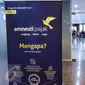 Sebuah banner terpasang di depan pintu masuk kantor pusat Ditjen Pajak, Jakarta, Minggu (25/9). Mendekati hari akhir periode pertama, Kantor Pajak membuka pendaftaran pada akhir pekan khusus melayani calon peserta tax amnesty. (Liputan6.com/Fery Pradolo)