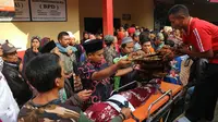 Pelepasan jenazah korban longsor Purbalingga. (Foto: Liputan6.com/Dinkominfo Purbalingga/Muhamad Ridlo)