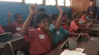 Siswa di Papua bersemangat untuk sekolah. (Liputan6.com/Katharina Janur)