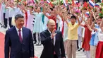 Presiden Rusia Vladimir Putin (tengah) dan Presiden China Xi Jinping menghadiri upacara penyambutan di Balai Besar Rakyat, Beijing, China, pada Rabu 20 Mei 2026. (Alexander Kazakov, Sputnik, Kremlin Pool Photo via AP)