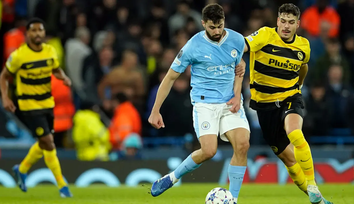 Pencapaian apik tersebut membuat Manchester City yang juga juara bertahan Liga Champions jadi tim pertama yang lolos ke babak gugur. (AP Photo/Dave Thompson)