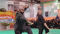 Pendekat silat asal Italia saat mengikuti workshop pencak silat Internasional di Ponpes Dzikir Al Fath Kota Sukabumi. (Liputan6.com/Fira Syahrin).