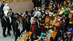 Anggota DPR dari PKB melakukan aksi walk out dan meninggalkan ruangan Rapat Paripurna, Jakarta, (2/10/14). (Liputan6.com/Andrian M Tunay)