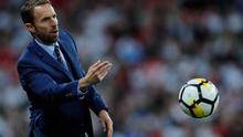 Gareth Southgate lega setelah mengantarkan Inggris lolos ke putaran final Piala Dunia 2018. (doc. FA)