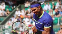 Dua petenis papan atas, Rafael Nadal (foto) dan Novak Djokovic, melaju ke babak ketiga Prancis Terbuka 2017, Rabu (31/5/2017). 