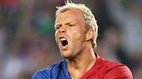 Reaksi striker Barcelona, Eidur Gudjohnsen di laga lawan Villarreal di Camp Nou, 10 Meui 2009. Laga berakhir imbang 3-3. AFP PHOTO/ JAIME REINA 