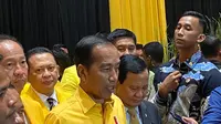 Presiden Joko Widodo atau Jokowi mengenakan baju bewarna kuning saat menghadiri Munas XI Partai Golkar di JCC Senayan Jakarta, Rabu (21/8/2024). (Tim News).