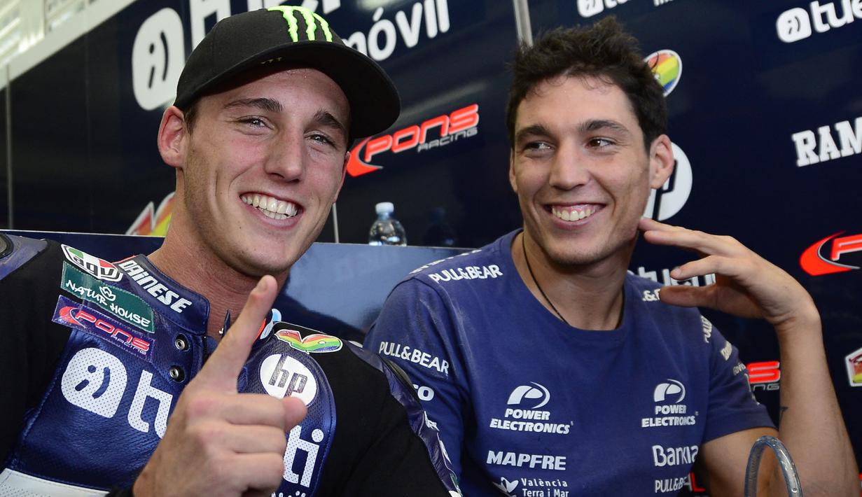 Pol dan Aleix Espargaro. Pol Espargaro, 30 tahun, berusia 2 tahun lebih muda dari Aleix Espargaro. Aleix, sang kakak 5 tahun lebih dulu memulai karier di balapan kelas dunia. Pada tahun 2014 keduanya sama-sama berlomba di MotoGP, dan menjadi debut Pol Espargaro di MotoGP. (AFP/Javier Soriano)