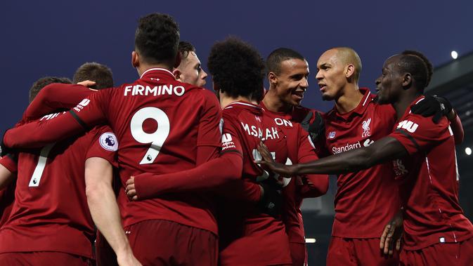 1. Liverpool - 60 poin (AFP/Paul Ellis)