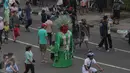 Suasana Car Free Day di kawasan Bundaran HI, Jakarta, Minggu (27/12/2015). Kemeriahan libur akhir tahun dimanfaatkan warga untuk menikmati lengangnya Jakarta. (Liputan6.com/Angga Yuniar)