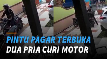 Video CCTV memperlihatkan dua orang pria melakukan pencurian sepeda motor di rumah Lurah.