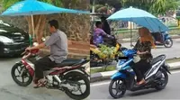 Kumpulan Potret Cara Unik Pemotor Mencegah Kulit Tersengat Panasnya Sinar Matahari (ist)
