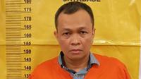 Mantan Pimpinan Cabang BNI Bengkalis yang ditangkap Polda Riau karena korupsi kredit usaha rakyat. (Liputan6.com/M Syukur)