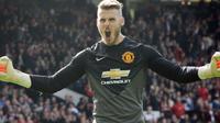 KONTRAK - David De Gea menandatangani kontrak baru berdurasi empat musim bersama MU. (Sky Sports)