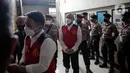 Terdakwa Chuck Putranto, Irfan Widyanto, dan Baiquni Wibowo tiba di Pengadilan Negeri Jakarta Selatan, Jakarta, Rabu (19/10/2022). Mereka akan menjalani sidang lanjutan kasus obstruction of justice terkait pembunuhan berencana terhadap Brigadir Nopriansyah Yosua Hutabarat atau Brigadir J. (Liputan6.com/Faizal Fanani)