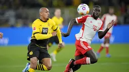 Berhadapan dengan sang rival, Borussia Dortmund, Die Roten menang dengan skor telak 4-0. (AP Photo/Martin Meissner)